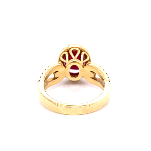 Oval Ruby and Halo Diamond Ring in 18K Yellow Gold