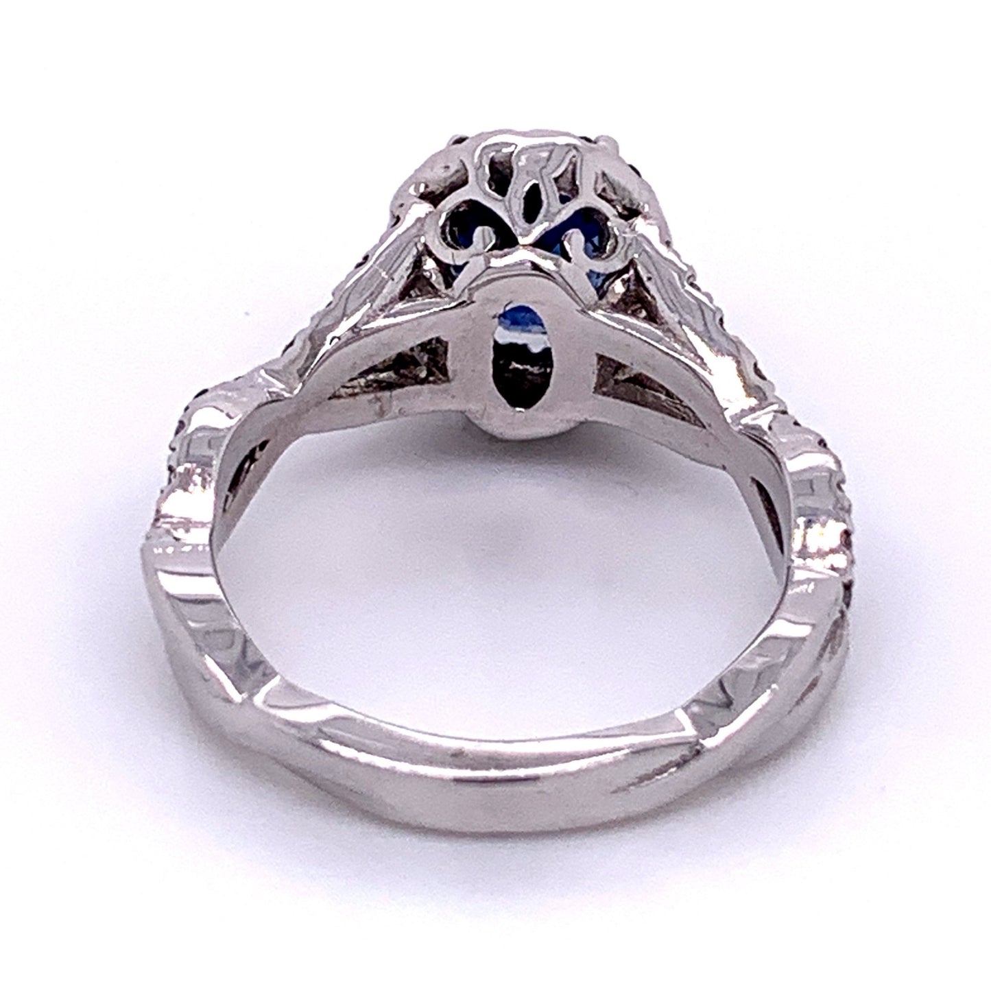 Oval Sapphire and Diamond Halo Ring in 14K White Gold